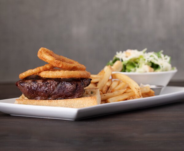Steak Sandwich & Fries at Shark Club Sports Bar & Grill